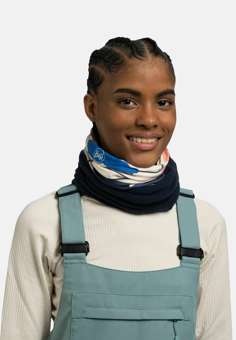 Gaiter multifuncional en azul marino y crema, con un diseño floral. Fabricado en un material suave y elástico, adecuado para el uso al aire libre.