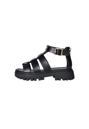 Sandalò nero in pelle con suola carrarmato, tre cinturini anteriori, cinturino alla caviglia con fibbia dorata e chiusura con cerniera sul retro.