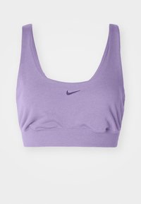 Purple cotton sports bra with a scoop neckline, wide straps, and a gathered front design. Features a small dark logo on the center front.