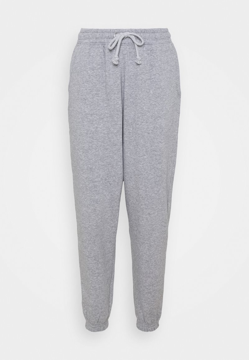 Grå bomullsbyxor med dragsko i midjan, smalnande ben och elastiska fållar, med en mjuk textur och minimalistisk design.