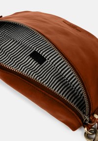 Brown leather pouch with a smooth texture, featuring a striped fabric lining and a metal zipper with circular hardware.