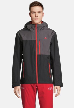 Schwarze und graue wasserdichte Jacke mit Kapuze, ausgestattet mit roten Reißverschlüssen und Akzenten, Reißverschlusstaschen und einem modernen, figurschmeichelnden Design.