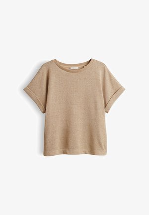 Beiges kurzärmeliges Stricktop mit aufgerollten Bündchen und rundem Ausschnitt, flach auf weißem Hintergrund präsentiert.