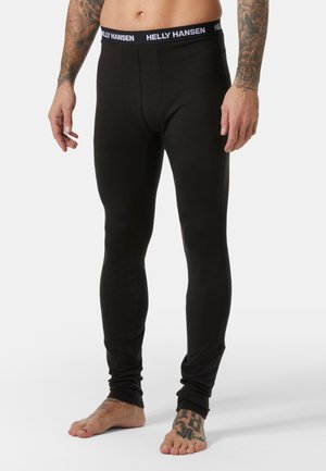 Zwarte thermoleggings met een aansluitend ontwerp, een gladde textuur en een contrasterende witte tailleband met het "HELLY HANSEN" logo.