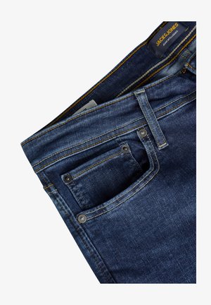 Dark blue denim jeans with a straight cut, featuring contrasting yellow stitching, a small pocket, and metal button accents.