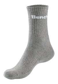 Graue Crew-Socke mit geripptem Design. Mit weißem "Bench"-Logo nahe der Oberkante. Abgerundete Zehenpartie und verstärkter Fersenbereich für erhöhte Haltbarkeit.