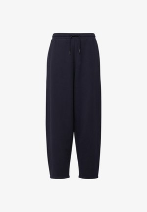 Schwarze Sweatpants mit Kordelzug, elastischem Bund und Seitentaschen, konisch zulaufendes Bein, vor weißem Hintergrund.