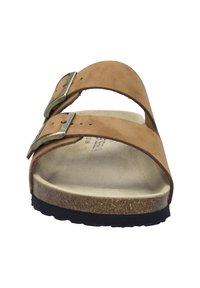Tan leather sandal with two adjustable buckled straps, a cushioned beige footbed, and a textured black rubber sole.