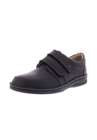 Schwarze Lederschuhe mit zwei Klettverschlussriemen, runder Zehenform, kontrastierenden Nähten und gepolsterter Sohle für zusätzlichen Komfort.