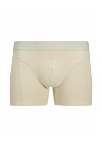 Beige Boxershorts aus weichem Stoff, mit eng anliegender Passform, Nahtdetails und einem hellgrünen Elasthanbund mit "Originals Studio"-Logo.