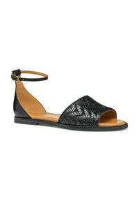 Sandalias de cuero trenzado negro con correa al tobillo, punta abierta y suela plana. Presentan un interior suave en tono marrón claro y un exterior negro contrastante.