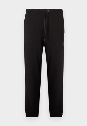 Pantaloni jogger neri con vita e polsini elasticizzati, coulisse regolabile e tasche laterali, mostrati su sfondo bianco.