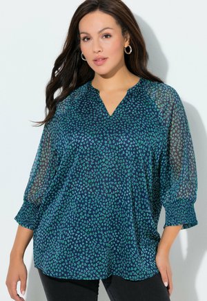 - Bluzka z długim rękawem