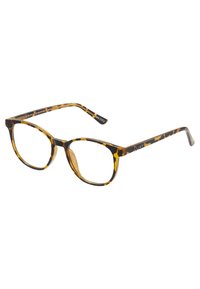 Gafas de sol de estilo cat-eye en carey con un acabado brillante, montura gruesa y patillas delgadas. Marca Quay en la patilla. Las lentes son transparentes.