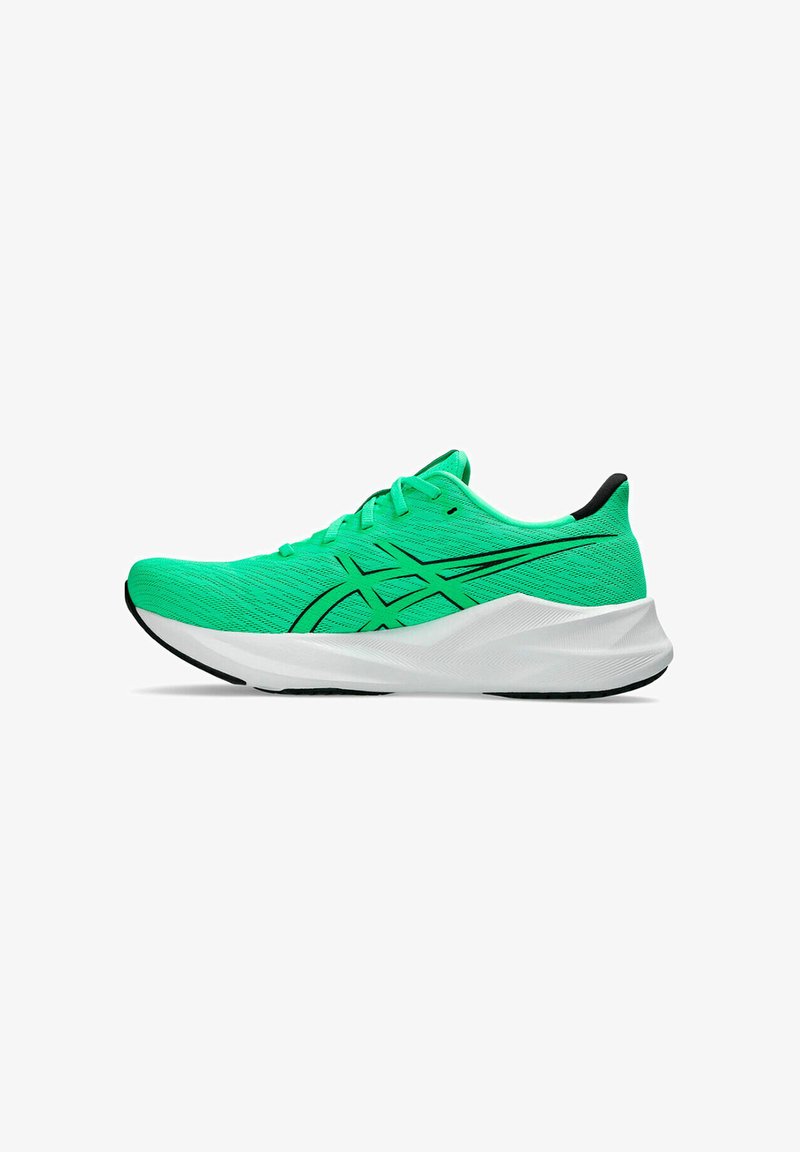 Bright green running shoe with black logo and laces, white thick sole, side view on a white background.