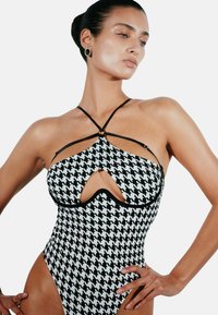 Perilla HEARTBREAKER - Jednodílné plavky - black