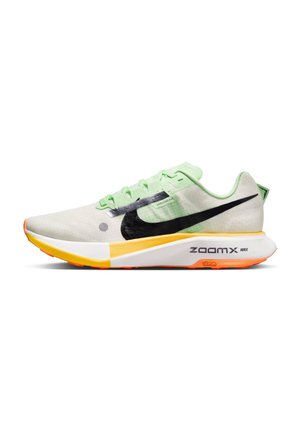 Lightweight Nike running shoe, featuring a mesh upper in green and gray, black Swoosh logo, and a multicolored sole with ZoomX technology.