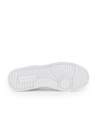 White sneaker sole featuring a textured rubber design with horizontal and vertical grooves, a circular emblem, and a sturdy construction.