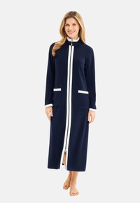 Navy zip-front robe with white accent stripes, long sleeves, two front pockets, and a mid-calf length, made from soft fabric.