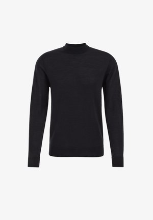 Mustvalge kudum, millel on kõrge ümar kaelus, pikad varrukad ning soonikkoes mansetid ja alläär. Sile tekstuur ja sirge joonega lõige.