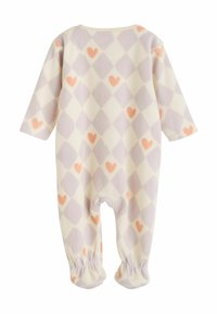 Kreminės spalvos poliesterio jumpsuit'as su lavandų spalvos deimantų raštu ir persikų širdelėmis. Ilgos rankovės ir surištos kulkšnys. Minkšta tekstūra.