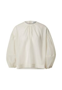 Hellbeige Bluse mit hochgeschlossenem, rundem Ausschnitt und langen Puffärmeln. Mit gerafften Details an den Schultern und einem geraden Saum.