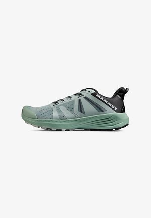 Helle grüne Sportschuh mit schwarzen Akzenten, strukturiertem Obermaterial und verstärkter Zehenpartie. Verfügt über eine dämpfende Sohle und synthetische Materialien.