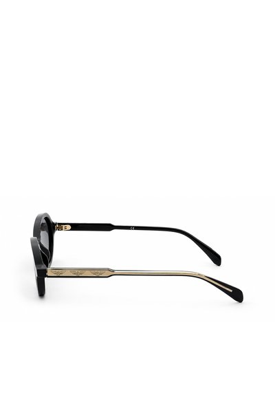 Black and gold sunglasses with thick black frames and gold arms featuring three engraved bee motifs on white background.