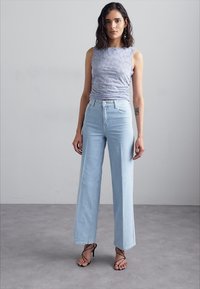 Baum und Pferdgarten NINI niebieski denim