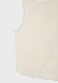 Linnedtank top i creme med rund halsudskæring og ærmeløs design. Har en glat, struktureret overflade og rundet kant.