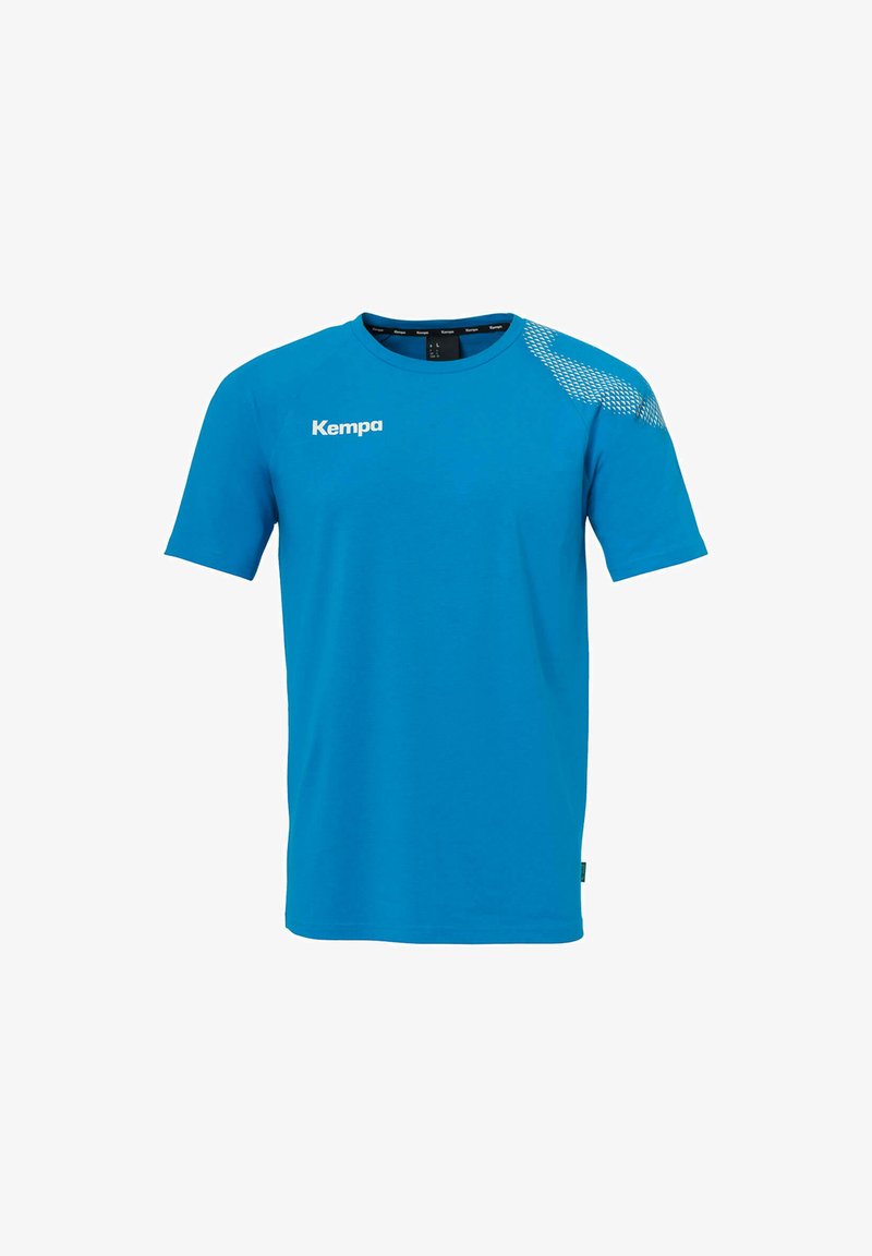 Blauwe T-shirt met korte mouwen, gemaakt van gladde stof. Kenmerkt zich door een gaaspatroon op één schouder en een wit "Kempa" logo op de borst.