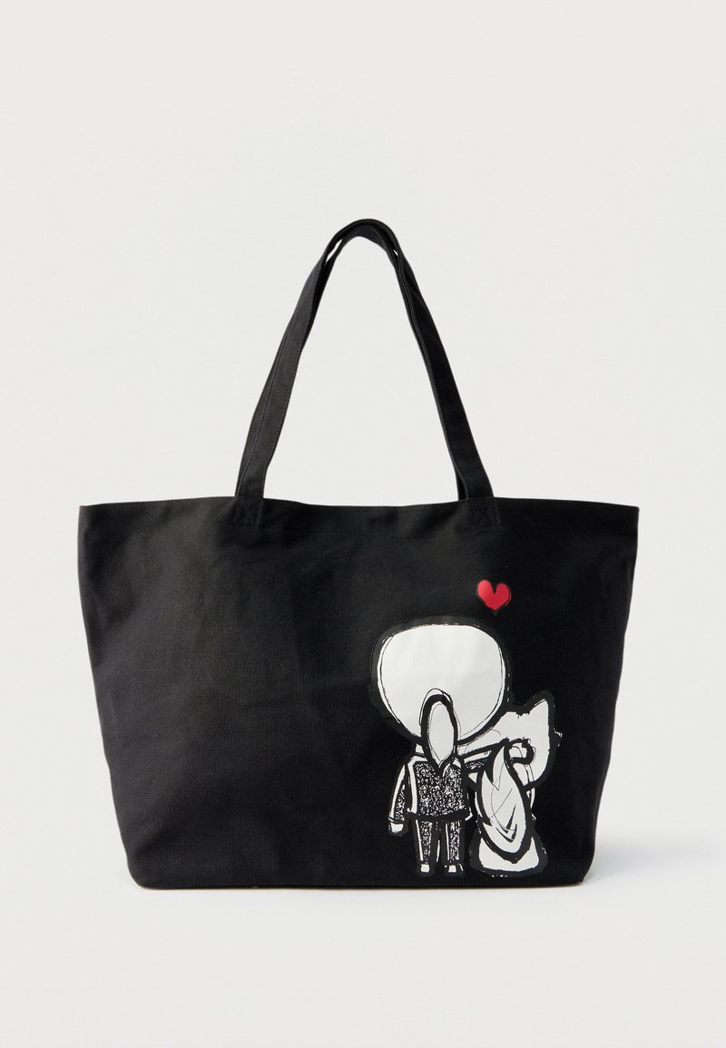 Črna torba za nošenje z risanko dveh oseb, ki se objemata, ena drži srce nad njima, na enobarvnem ozadju.