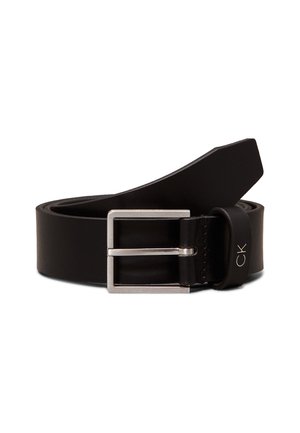 Black leather belt with silver rectangular buckle and "CK" logo on the belt loop, coiled with the tip pointed upward.