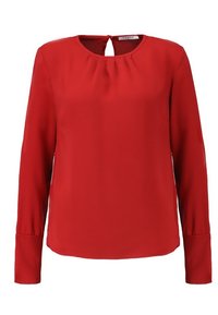 Blusa rossa a maniche lunghe realizzata in tessuto morbido, caratterizzata da un collare tondo con un'apertura a forma di chiave e un leggero arricciamento sul davanti.