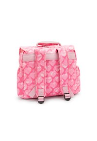 Sac à dos en tissu rose avec un motif de formes roses plus claires. Présente des poches latérales doubles, deux sangles réglables et une poignée en haut.