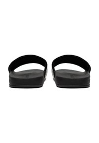 Infradito neri con suola piatta, dotati di una fascia texture e di una soletta liscia. Design semplice, senza logo o decorazioni visibili.