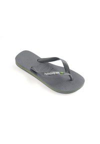 Infradito grigi in gomma con una soletta testurizzata, sottili cinghie nere e un accento verde sulla suola, con il logo "Havaianas".