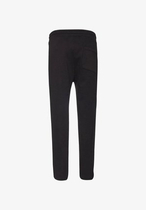 Pantaloni sportivi neri realizzati in tessuto morbido, con vestibilità rilassata, vita elastica e una singola tasca sul retro sul lato destro.