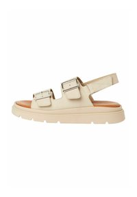 Beige sandal with two wide straps and metal buckles. Platform sole with a textured finish and an open heel design.