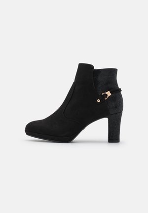 Bottines à talons hauts - black