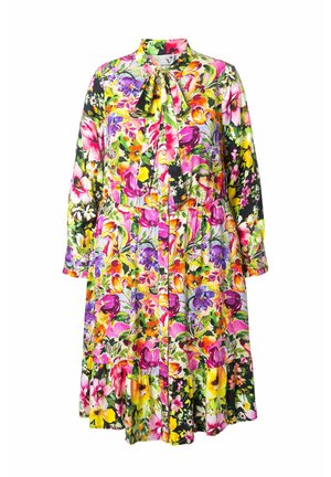 Robe à manches longues, longueur genou, avec motif floral coloré, détail noué au col et taille froncée sur fond blanc.