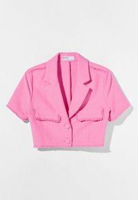 Cropped blazer in bright pink textured fabric, featuring short sleeves, two front pockets, and frayed edges. Two buttons at front closure.