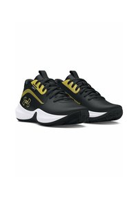 Scarpe da ginnastica nere con accenti gialli, tomaia in materiale sintetico, suola testurizzata per la presa, design con lacci e logo del marchio sul lato.