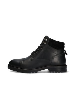 Zwarte leren enkelboot met een gestructureerde suede kraag, stevige rubberen zool, ronde neus en metalen oogjes voor de veters. Heeft een decoratieve lus aan de achterkant.