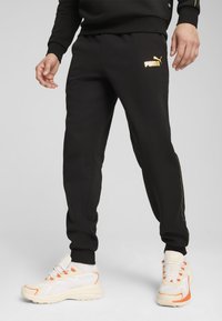 Puma MINIMAL GOLD JOGGING - Pantalones deportivos - black