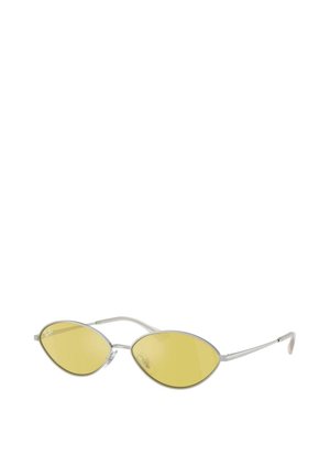 Gafas de sol con tinte amarillo, con una forma alargada y ovalada de las lentes y un delicado marco plateado. Presentan un diseño minimalista y brazos de varilla afilados.
