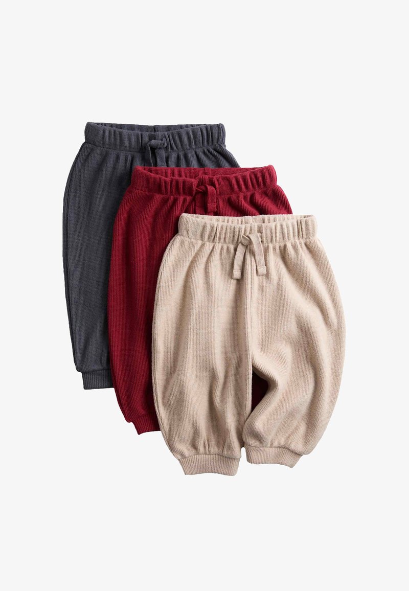 Drei Paare von Kinder-Lounge-Shorts: dunkelgrau, burgunderrot und beige. Aus strukturiertem Stoff, mit elastischen Taillenbündchen und Kordeln.