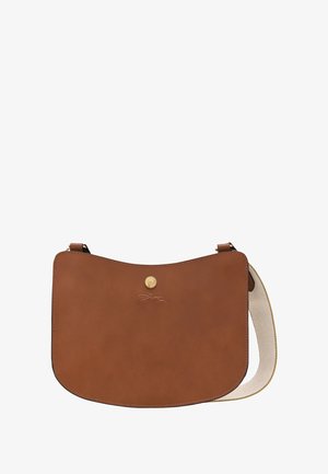 Brown leather shoulder bag with a gold button clasp, embossed running dog logo, and beige textile adjustable strap.