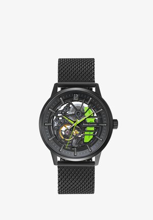 Skeleton watch with black metal case and mesh black strap. Features green accents, exposed gears, and white hour markers on a black dial.