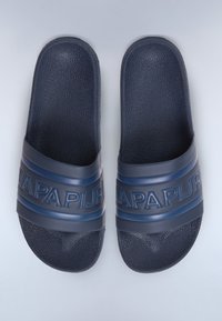Navy blue slide sandals made of textured rubber with a wide strap featuring embossed brand name across the center and a cushioned sole.